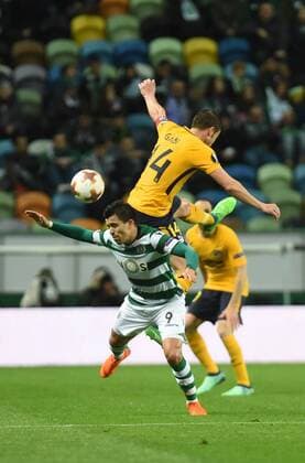 (180413) -- LISBON, April 13, 2018 -- Marcos Acuna (Down) of Sporting vies with Gabi of Atletico during the Europa League quarterfinal second leg soccer match between Sporting CP and Club Atletico de Madrid at the Jose Alvalade stadium in Lisbon, Portugal, on April 12, 2018. Sporting won 1-0 but was eliminated by a 1-2 aggregate. ) (SP)PORTUGAL-LISBON-SOCCER-UEFA EUROPA LEAGUE-QUARTERFINAL-ATLETICO VS SPORTING ZhangxYadong 
