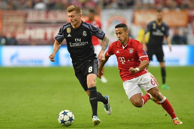 FC Bayern face Real Madrid in the Champions League semi-final Toni KROOS Real Madrid action match Thiago ALCANTARA FCB FC Bayern Munich Real Madrid 1 2 Football Champions League quarter-finals on 12 04 2017 A L L A N N A R A N A