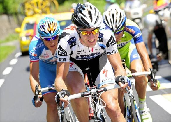 - TARBES, FRANCE: German cyclist Jens Voigt (front) of the Saxo Bank team, French cyclist Pierrick Fedrigo (L) of the Bbox Bouygues Telecom team and Italian cyclist Franco Pellizotti (R) of the Liquigas team ride in a breakaway during the ninth stage of the Tour de France cycling race, from Saint-Gaudens to Tarbes (160km), Sunday 12 July 2009. Fedrigo won the ninth stage. ERICxLALMAND  x14579179x