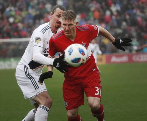 Themen der Woche - SPORT KW15 Bilder des Tages - SPORT April 14, 2018 - Bridgeview, IL, USA - Los Angeles Galaxy forward Zlatan Ibrahimovic, left, and Chicago Fire midfielder Bastian Schweinsteiger during the first half at Toyota Park in Bridgeview, Ill., on Saturday, April 14, 2018. The Galaxy won, 1-0. LA Galaxy at Chicago - ZUMAm67_ 20180414_zaf_m67_063 Copyright: xNuccioxDinuzzox