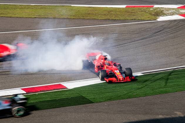 German F1 Sebastian Vettel of Ferrari and Dutch F1 driver Max Verstappen of Red Bull Racing collide as they compete during the 2018 Formula One Chinese Grand Prix at the Shanghai International Circuit in Shanghai, China, 15 April 2018. Daniel Ricciardo charged from sixth to score a stunning first win of the 2018 Formula 1 season as Max Verstappen and Sebastian Vettel collided in a wild Chinese Grand Prix. Bottas and Vettel were locked in their own battle for the win until Ricciardo and Verstappen pitted again for fresh, soft tyres during a safety car period just after the halfway mark as their rivals stayed on mediums. Ricciardo then overtook his team-mate, Lewis Hamilton and Vettel in quick succession before executing a stunning pass on Bottas into the tight Turn 6 right-hander for the victory. Verstappen and Vettel collide in Chinese Grand Prix 