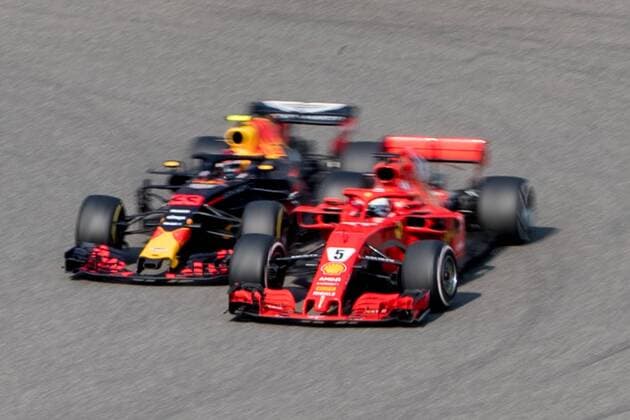 German F1 Sebastian Vettel of Ferrari and Dutch F1 driver Max Verstappen of Red Bull Racing collide as they compete during the 2018 Formula One Chinese Grand Prix at the Shanghai International Circuit in Shanghai, China, 15 April 2018. Daniel Ricciardo charged from sixth to score a stunning first win of the 2018 Formula 1 season as Max Verstappen and Sebastian Vettel collided in a wild Chinese Grand Prix. Bottas and Vettel were locked in their own battle for the win until Ricciardo and Verstappen pitted again for fresh, soft tyres during a safety car period just after the halfway mark as their rivals stayed on mediums. Ricciardo then overtook his team-mate, Lewis Hamilton and Vettel in quick succession before executing a stunning pass on Bottas into the tight Turn 6 right-hander for the victory. Verstappen and Vettel collide in Chinese Grand Prix 
