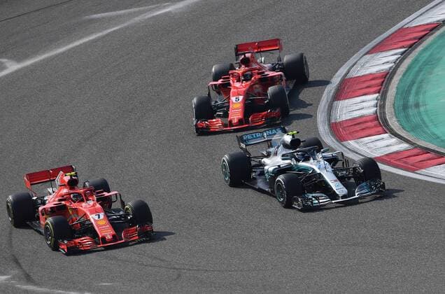 Kimi Raiikkoenen Sebastian Vettel Scuderia Ferrari Valtteri Bottas Mercedes Grand Prix formula 1 China GP in Shanghai 15 04 2018 Jerry Andre Kimi Raiikkoenen Sebastian Vettel Valtteri Bottas Formula 1 GP China 2018