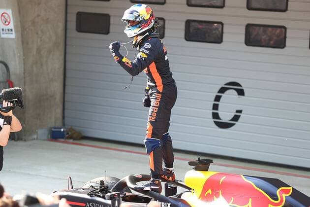 Australian F1 driver Daniel Ricciardo of Red Bull Racing celebrates after winning the 2018 Formula One Chinese Grand Prix at the Shanghai International Circuit in Shanghai, China, 15 April 2018. Daniel Ricciardo charged from sixth to score a stunning first win of the 2018 Formula 1 season as Max Verstappen and Sebastian Vettel collided in a wild Chinese Grand Prix. Bottas and Vettel were locked in their own battle for the win until Ricciardo and Verstappen pitted again for fresh, soft tyres during a safety car period just after the halfway mark as their rivals stayed on mediums. Ricciardo then overtook his team-mate, Lewis Hamilton and Vettel in quick succession before executing a stunning pass on Bottas into the tight Turn 6 right-hander for the victory. Daniel Ricciardo storms to Chinese Grand Prix victory for Red Bull 