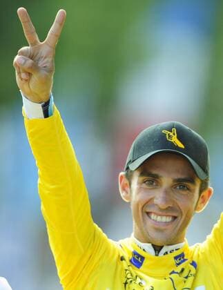 - PARIS, FRANCE: Spanish overall winner Alberto Contador of team Astana celebrates in the yellow jersey of the overall leader in the general ranking, on the podium, after the 21st and last stage of the Tour de France cycling race, between Montereau-Fault-Yonne and Paris, Champs-Elysees (160km), Sunday 26 July 2009. ERICxLALMAND  x14776608x