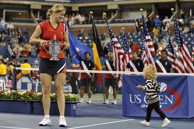 - NEW YORK, USA : Belgian tennis player Kim Clijsters and her daughter Jada Ellie Lynch pictured with the trophy during the ceremony after she won 7-5, 6-3 the US Open final match against Caroline Wozniaki of Denmark, at the US Open Grand Slam Tennis tournament, at Flushing Meadows, in New York, Sunday 13 September 2009. Clijsters won a Grand Slam title just one month after her coming back to competition, after two years break during wich she became a mother. PHILIPPExBUISSIN  x15359708x