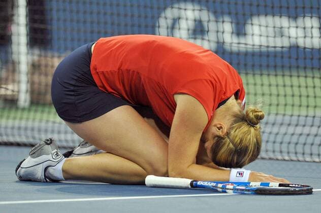 - NEW YORK, USA : Belgian tennis player Kim Clijsters celebrates after she won 7-5, 6-3 the US Open final match against Caroline Wozniacki of Denmark, at the US Open Grand Slam Tennis tournament, at Flushing Meadows, in New York, Sunday 13 September 2009. Clijsters won a Grand Slam title just one month after her coming back to competition, after two years break during wich she became a mother. PHILIPPExBUISSIN  x15362576x