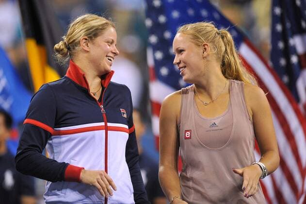 - NEW YORK, USA : Belgian tennis player Kim Clijsters celebrates after she won 7-5, 6-3 the US Open final match against Caroline Wozniacki (R) of Denmark, at the US Open Grand Slam Tennis tournament, at Flushing Meadows, in New York, Sunday 13 September 2009. Clijsters won a Grand Slam title just one month after her coming back to competition, after two years break during wich she became a mother. PHILIPPExBUISSIN  x15362646x