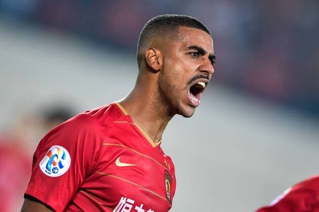 Brazilian football player Alan Carvalho of China s Guangzhou Evergrande Taobao FC celebrates after scoring against Japan s Cerezo Osaka FC in their Group G match during the 2018 AFC Champions League in Guangzhou city, south China s Guangdong province, 17 April 2018. Brazilian striker Alan Carvalho scored twice in the second half to help Guangzhou Evergrande beat the visiting side Cerezo Osaka from Japan 3-1 in a Group G game, final round of the AFC Champions League group stage on Tuesday night. After this game, Guangzhou Evergrande remained unbeaten in this group, earning 12 points and place the first to progress to the knock-out stage of the AFC Champions League, while Buriram United from Thailand managed a 1-0 win over home team Jeju United from South Korea and secured another place in the knock-out stage. Huang Bowen broke the deadlock for Guangzhou Evergrande early in the fifth minute, as the 30-year-old midfielder received the pass from Li Xuepeng, got away from defenders in the penalty area and scored the opening goal. Guangzhou Evergrande beat Cerezo Osaka 3-1 in AFC Champions League  20180417_88929