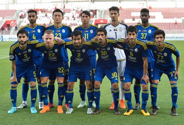 (180418) -- DOHA, April 18, 2018 -- Al Wahda FSCC players pose for a team photo prior to the AFC Champions League Group B soccer match between Qatar s AL Duhail SC and UAE s Al Wahda FSCC at Abdullah bin Khalifa Stadium in Doha, Qatar, April 17, 2018. Al Duhail won 1-0. ) (SP)QATAR-DOHA-SOCCER-AFC CHAMPIONS Nikku 