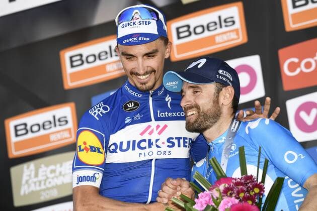 Winner French Julian Alaphilippe of Quick-Step Floors and 2nd place Spanish Alejandro Valverde of Movistar Team celebrate on the podium after the 82nd edition of the men s race of La Fleche Wallonne , a one day cycling race (Waalse Pijl - Walloon Arrow), 198,5km from Seraing to Huy, Wednesday 18 April 2018. YORICKxJANSENS  x05331529x