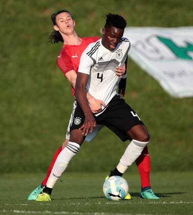 SOCCER - U18, AUT vs GER, test match WELS,AUSTRIA,18.MAR.18 - SOCCER - Under 18, OEFB international match Länderspiel Austria vs Germany, test match. Image shows Rene Hellermann (AUT) and Yann Aurel Bisseck (GER). GEPAxpictures xWalterxLuger