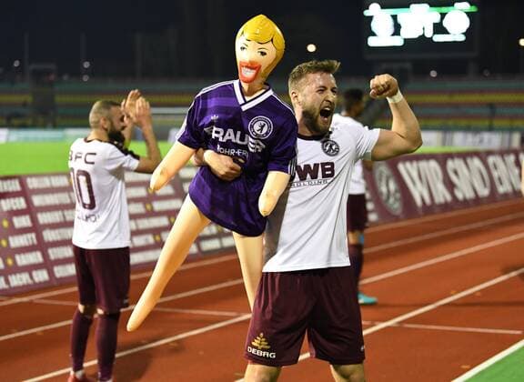 Football Mens Season 2017 2018 Semifinals in the Berlin Pilsner Cup BFC Dynamo Tennis Borussia Bilal Cubukcu BFC Dynamo Vincent Rabiega BFC Dynamo with rubber doll from the fan block in the jersey of Hans Rosenthal Elf was TeBe Fan Jubel after the final whistle 18 04 2018 Copyright: xMatthiasxKochx