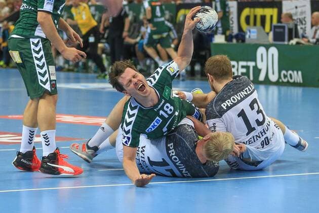 Germany Kiel Handball 1 Bundesliga Sparkassenarena Season 2017 2018 THW Kiel Füchse Berlin Hans Lindberg THW Patrick Wiencek Steffen Weinhold Berlin
