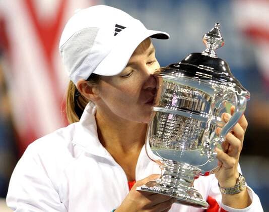 20070908 - NEW YORK, USA: Belgian Justine Henin kisses her trophy after defeating Russian Svetlana Kuznetsova in the US Open Women s final at the USTA National Tennis Center in Flushing Meadows, New York, 08 September 2007. It s the 7th Grand Slam title that she won in her carreer and it is the second time that she won the US Open. Henin won with 6-1,6-3. PHILIPPExBUISSIN  x7390032x