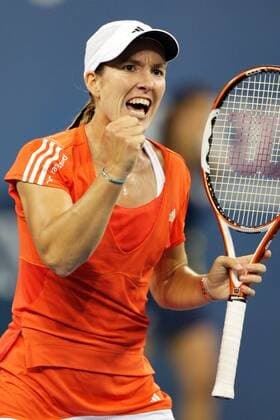 - NEW YORK, USA: Belgian Justine Henin celebrates after defeating Russian Svetlana Kuznetsova in the US Open Women s final at the USTA National Tennis Center in Flushing Meadows, New York, 08 September 2007. It s the 7th Grand Slam title that she won in her carreer and it s second time that she won the US Open. Henin won with 6-1,6-3. PHILIPPExBUISSIN  x7390084x