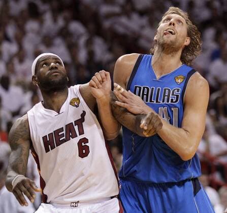 June 12, 2011 - Miami, FL, USA - LeBron James, left, and Dirk Nowitzki jockey for position under the basket during Game 6 of the NBA Basketball Herren USA Finals between the Miami Heat and the Dallas Mavericks at the AmericanAirlines Arena in Miami on June 12, 2011. Chris Vognar: Is basketball AmericaÃ¢â‚¬â ¢s game? - ZUMAm67_ 20110612_zaf_m67_002 Copyright: xAlxDiazx