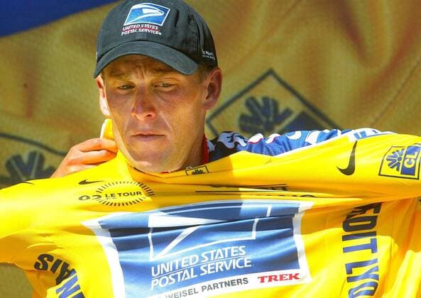 NO MAGS - NO SALES - NO INTERNET BRU180 - - PLATEAU-DE-BEILLE, FRANCE : Yellow jersey, leader of the US Postal Service team, US Lance Armstrong, celebrates on the podium of the 12th stage of the 89th Tour de France in Plateau-de-Beille, Thursday 19 July 2002. Armstrong won the stage and retains his yellow jersey MICHELxGOUVERNEUR  x1003054x