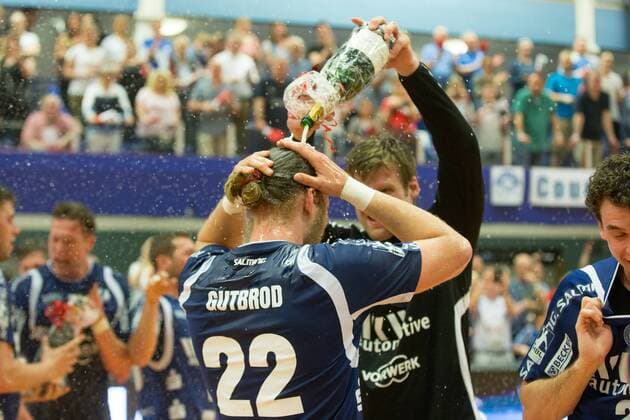 Fabian Gutbrod 22 Bergischer HC is considered by Linus Arnesson 24 Bergischer HC with a champagne shower and both celebrate with the rise T shirt the rise in the 1 Bundesliga Bergischer HC vs Wilhelmshavener HV Handball 2 Bundesliga 20 04 18 Solingen NRW Germany Klingenhalle Copyright: xcdnx