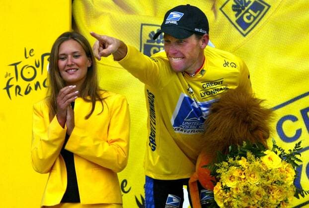 BRU290 - - LUZ-ARDIEN, BELGIUM : US Lance Armstrong (US Postal USA) celebrates on the podium of the 15th stage of the 90th Tour de France cycling race between Bagneres-de-Bigorre and Luz-Ardiden, on Monday 21 July 2003. Armstrong won the stage. FRANCOISxWALSCHAERTS  x1335274x