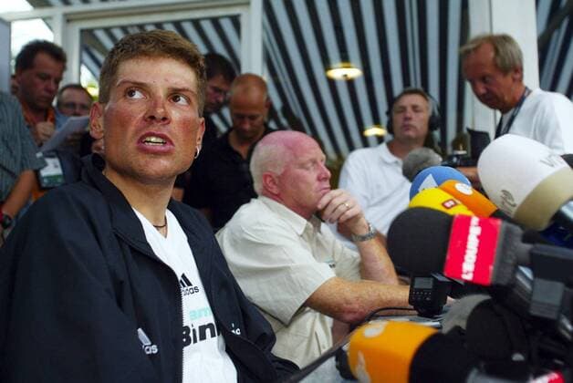 BRU73 - - PAU, FRANCE : German Jan Ullrich (Bianchi Ger) (L) and team s sports director Rudy Pevenage (C) pictured during a news conference on a rest day of the 90th Tour de France, 22 July 2003 in Pau. FRANCOISxWALSCHAERTS  x1335877x