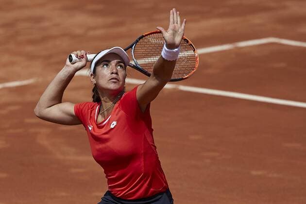 April 21, 2018 - La Manga, Murcia, Spain - Montserrat Gonzalez of Paraguay in action in his match against Garbine Muguruza of Spain during day one of the Fedcup World Group II Play-offs match between Spain and Paraguay at Centro de Tenis La Manga Club on April 21, 2018 in La Manga, Spain Spain v Paraguay - Fedcup by BNP Paribas World Group II Play-offs  - ZUMAn230 20180421_zaa_n230_638 Copyright: xDavidxAliagax