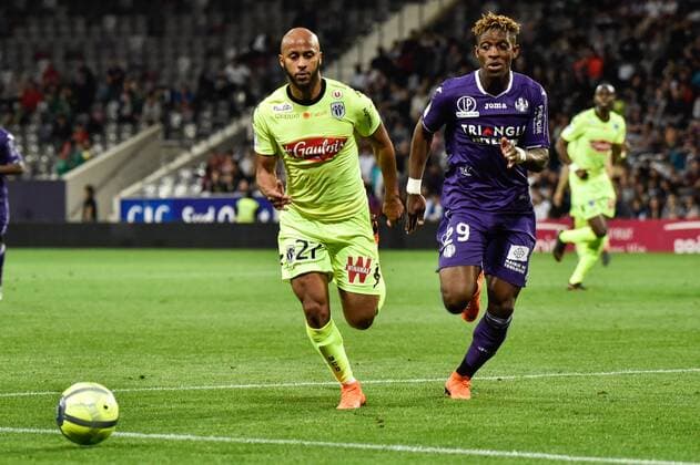 Thomas Toure (sco) vs Jacques Moubandje (tfc) FOOTBALL : Toulouse vs Angers - 34eme Journee de L1 - Toulouse - 21 04 2018 ThierryBreton Panoramic 