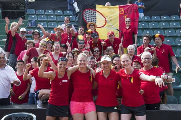Belgian Kirsten Flipkens, Belgian Ysaline Bonaventure, Belgian Elise Mertens, Belgian Alison Van Uytvanck and Belgian captain Ivo Van Aken celebrate with the supporters after winning a double tennis game between Italian pair Deborah Chiesa and Jessica Pieri and Belgian pair Kirsten Flipkens and Elise Mertens, the fourth rubber of this weekend s Fed Cup World Group Play Off meeting between Italy and Belgium in Genoa, Italy, Sunday 22 April 2018. Belgian already won 0-3. LAURIExDIEFFEMBACQ  x05334209x