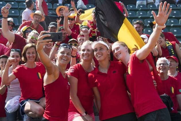Belgian Kirsten Flipkens, Belgian Ysaline Bonaventure, Belgian Elise Mertens and Belgian Alison Van Uytvanck celebrate after winning a double tennis game between Italian pair Deborah Chiesa and Jessica Pieri and Belgian pair Kirsten Flipkens and Elise Mertens, the fourth rubber of this weekend s Fed Cup World Group Play Off meeting between Italy and Belgium in Genoa, Italy, Sunday 22 April 2018. Belgian already won 0-3. LAURIExDIEFFEMBACQ  x05334223x