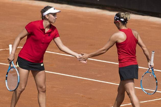 Belgian Elise Mertens and Belgian Kirsten Flipkens celebrate during a double tennis game between Italian pair Deborah Chiesa and Jasmine Paolini and Belgian pair Kirsten Flipkens and Elise Mertens, the fourth rubber of this weekend s Fed Cup World Group Play Off meeting between Italy and Belgium in Genoa, Italy, Sunday 22 April 2018. Belgian already won 0-3. LAURIExDIEFFEMBACQ  x05334273x