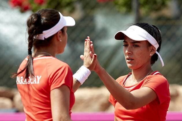 April 22, 2018 - La Manga, Murcia, Spain - Veronica Cepede (R) of Paraguay celebrates a point with her teammate Montserrat Gonzalez in their doubles match against Georgina Garca Perez and Maria Jose Martnez of Spain during day two of the Fedcup World Group II Play-offs match between Spain and Paraguay at Centro de Tenis La Manga Club on April 22, 2018 in La Manga, Spain Spain v Paraguay - Fed Cup by BNP Paribas World Cup Group II Play-Off  - ZUMAn230 20180422_zaa_n230_671 Copyright: xDavidxAliagax
