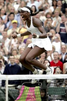 BRU107 - - WIMBLEDON, UNITED KINGDOM : US Venus Williams jumps delighted after defeating Lindsay Davenport in their final match of the Wimbledon Tennis Open, Saturday 02 July 2005, at the All England Lawn Tennis Club. DIDIER MOSSIAT DIDIERxMOSSIOAT  x3128037x