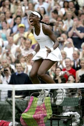 BRU109 - - WIMBLEDON, UNITED KINGDOM : US Venus Williams jumps delighted after defeating Lindsay Davenport in their final match of the Wimbledon Tennis Open, Saturday 02 July 2005, at the All England Lawn Tennis Club. DIDIER MOSSIAT DIDIERxMOSSIOAT  x3128039x