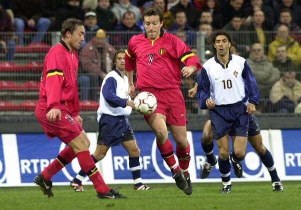 CHAR008 - - Charleroi ,Belgium : Belgian Red Devils Branko Strupar and Marc Wilmots controll the ball during the soccer friendly match Belgium vs Portugal tonight Wednesday 23 February 2000 in Charleroi (Belgium) , ahead of the European Soccer Championship which will take place in Belgium Netherland in June . (Electronic image). Belga photo Daniel Willam vdb DANIELxWILLAM  x443715x