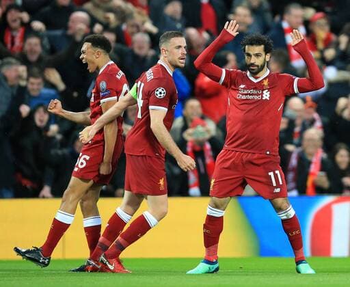 24th April 2018, Anfield, Liverpool, England; UEFA Champions League football, semi final, 1st leg, Liverpool versus AS Roma; Mohamed Salah of Liverpool celebrates his opening goal of the match in the 35th minute  ActionPlus12016811