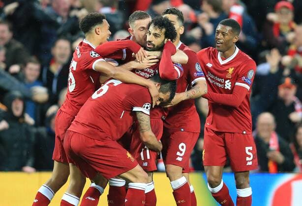 Bilder des Tages - SPORT 24th April 2018, Anfield, Liverpool, England; UEFA Champions League football, semi final, 1st leg, Liverpool versus AS Roma; Mohamed Salah of Liverpool celebrates his opening goal of the match with his team mates in the 35th minute  ActionPlus12016812
