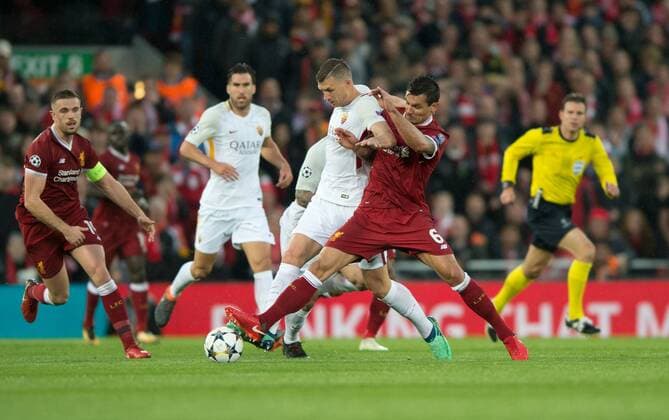 Liverpool v A.S. Roma UEFA Champions League Semi-Final Dejan Lovren of Liverpool (right) tackles Edin Dzeko of AS Roma during the UEFA Champions League Semi-Final match at Anfield, Liverpool Content Not Available For UK Newspapers Copyright: xRussellxHartx FIL-11698-0012