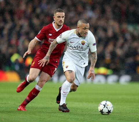Jordan Henderson of Liverpool chases after Radja Nainggolan of Roma during the Champions League Semi Final 1st Leg match at Anfield Stadium, Liverpool. Picture date: 24th April 2018. Picture credit should read: Simon Bellis Sportimage EDITORIAL USE ONLY. No use with unauthorised audio, video, data, fixture lists, club league logos or live services. Online in-match use limited to 120 images, no video emulation. No use in betting, games or single club league player publications.