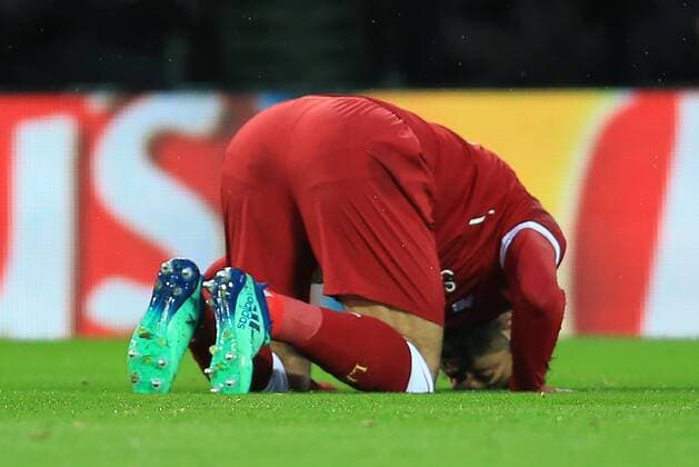 24th April 2018, Anfield, Liverpool, England; UEFA Champions League football, semi final, 1st leg, Liverpool versus AS Roma; Mohamed Salah of Liverpool celebrates his opening goal of the match  ActionPlus12016821
