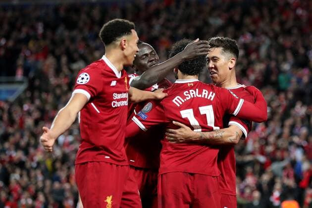 Football - 2017 2018 UEFA Champions League - Semi-Final, First Leg: Liverpool vs. A.S. Roma Roberto Firmino of Liverpool celebrates scoring his sides fourth goal with Trent Alexander-Arnold, Sadio Mane and Mohamed Salah, at Anfield. COLORSPORT PAUL GREENWOOD 