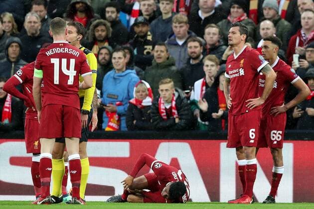 Football - 2017 2018 UEFA Champions League - Semi-Final, First Leg: Liverpool vs. A.S. Roma Alex Oxlade-Chamberlain lies injure on the pitch, at Anfield. COLORSPORT PAUL GREENWOOD 
