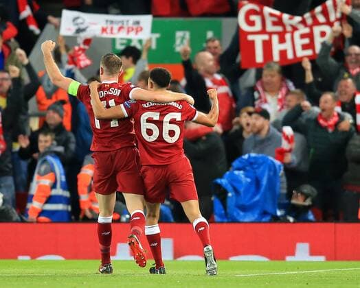 24th April 2018, Anfield, Liverpool, England; UEFA Champions League football, semi final, 1st leg, Liverpool versus AS Roma; Jordan Henderson and Trent Alexander-Arnold of Liverpool celebrate after theft team take a 3-0 lead after 56 minutes  ActionPlus12016844