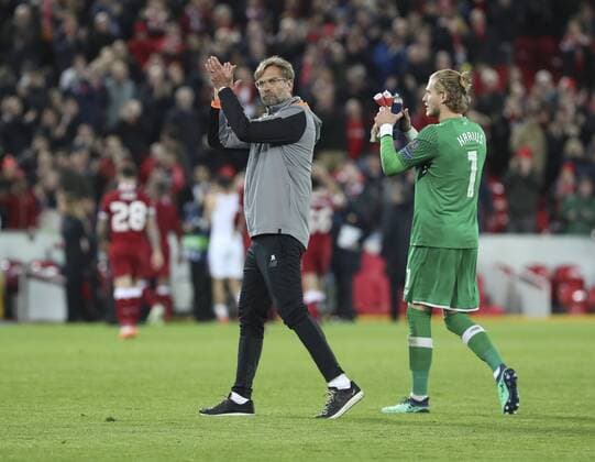 (180425) -- LIVERPOOL, April 25, 2018 -- Jurgen Klopp (L), manager of Liverpool greets the spectators after winning the UEFA Champions League Semi-finals 1st leg match between Liverpol FC and AS Roma at the Anfield Stadium in Liverpool, Britain on April 24, 2018. Liverpool won 5-2. )(wll) (SP)BRITAIN-LIVERPOOL-SOCCER-UEFA-CHAMPIONS LEAGUE-LIVERPOOL VS ROMA HanxYan 