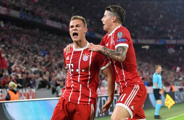 FOOTBALL CHAMPIONS LEAGUE SEASON 2017 2018 SEMINAL FINANCIAL AFFAIRS FC Bayern Muenchen Real Madrid 25 04 2018 Joshua Kimmich li and James Rodriguez re both FC Bayern Muenchen cheer for the goal to 1 0 Munich