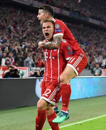 FOOTBALL CHAMPIONS LEAGUE SEASON 2017 2018 SEMINAL FINANCIAL AFFAIRS FC Bayern Muenchen Real Madrid 25 04 2018 Joshua Kimmich li and James Rodriguez re both FC Bayern Muenchen cheer for the goal to 1 0 Munich