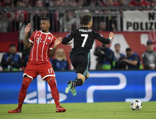 nacker duel action with Jerome Boateng FC Bayern Munich Demands Cristiano Ronaldo CR7 Real Madrid foul Bayern Munich FCB vs Real Madrid CF UEFA Champions League CL semi-final first leg match 1 season 2017 2018 Munich Allianz Arena 25 04 2018 FC Bayern Munich FCB vs Real Madrid CF