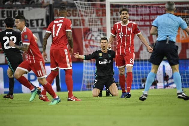 nacker duel action with Jerome Boateng FC Bayern Munich Demands Cristiano Ronaldo CR7 Real Madrid foul Bayern Munich FCB vs Real Madrid CF UEFA Champions League CL semi-final first leg match 1 season 2017 2018 Munich Allianz Arena 25 04 2018 FC Bayern Munich FCB vs Real Madrid CF