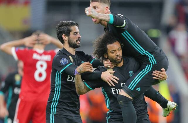 SOCCER - UEFA CL, Bayern vs Madrid MUNICH,GERMANY,25.APR.18 - SOCCER - UEFA Champions League, semifinal, FC Bayern Muenchen vs Real Madrid CF. Image shows the rejoicing of Isco, Marcelo and Sergio Ramos (Madrid). GEPAxpictures xThomasxBachun