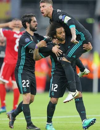 SOCCER - UEFA CL, Bayern vs Madrid MUNICH,GERMANY,25.APR.18 - SOCCER - UEFA Champions League, semifinal, FC Bayern Muenchen vs Real Madrid CF. Image shows the rejoicing of Isco, Marcelo and Sergio Ramos (Madrid). GEPAxpictures xThomasxBachun