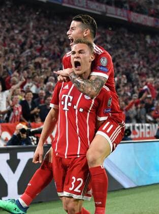 FOOTBALL CHAMPIONS LEAGUE SEASON 2017 2018 SEMI FINAL AFFAIRS FC Bayern Muenchen Real Madrid 25 04 2018 Joshua Kimmich in front and James Rodriguez both FC Bayern Muenchen cheer for the goal to 1 0 Munich